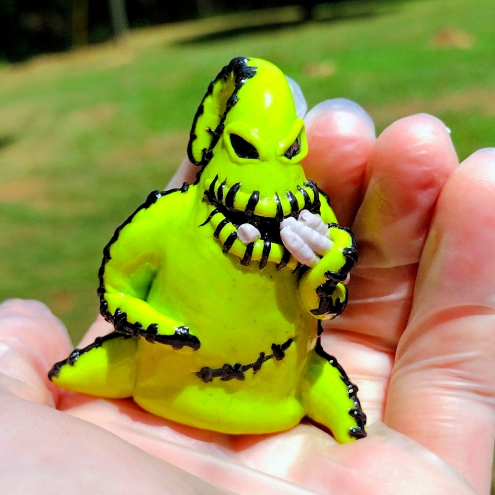 Hand Sculpted Oogie Boogie eating worms figurine